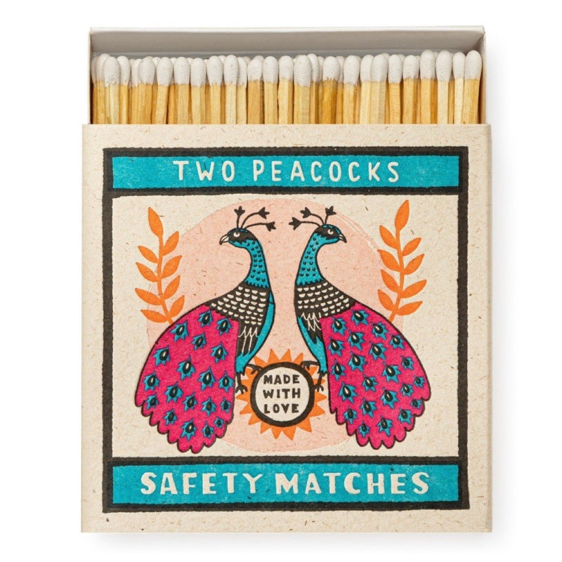 Two peacocks matches box